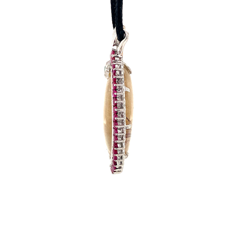 Natural golden rutilated quartz pendant set in 2mm ruby2